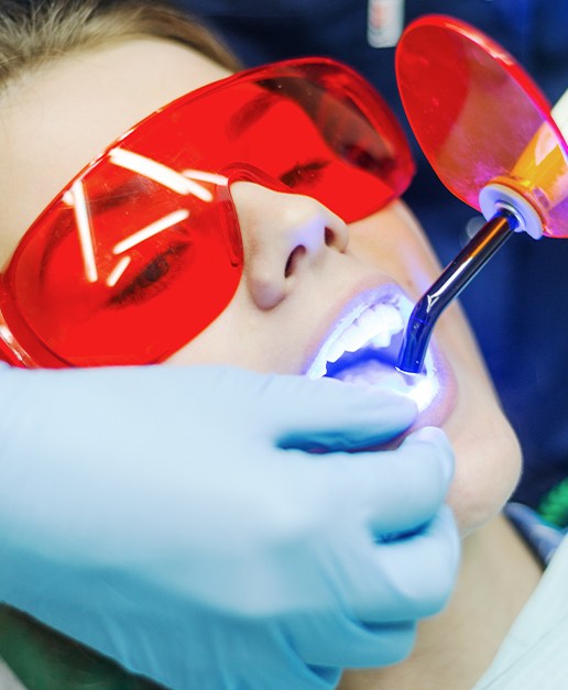 Patient receiving cosmetic dental bonding