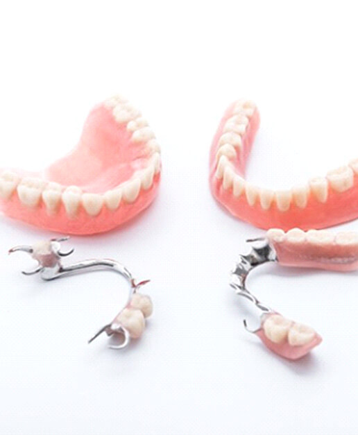 two full dentures and two partials