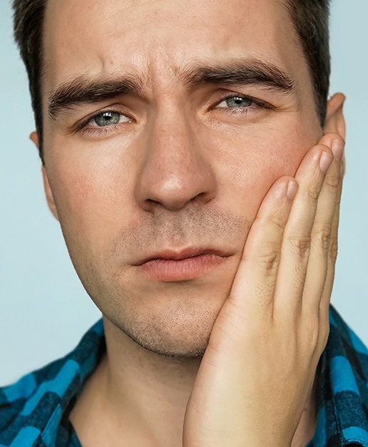 Man in pain before tooth extraction