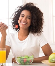 woman eating a salad