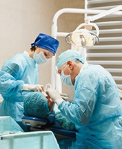 a person undergoing dental implant surgery