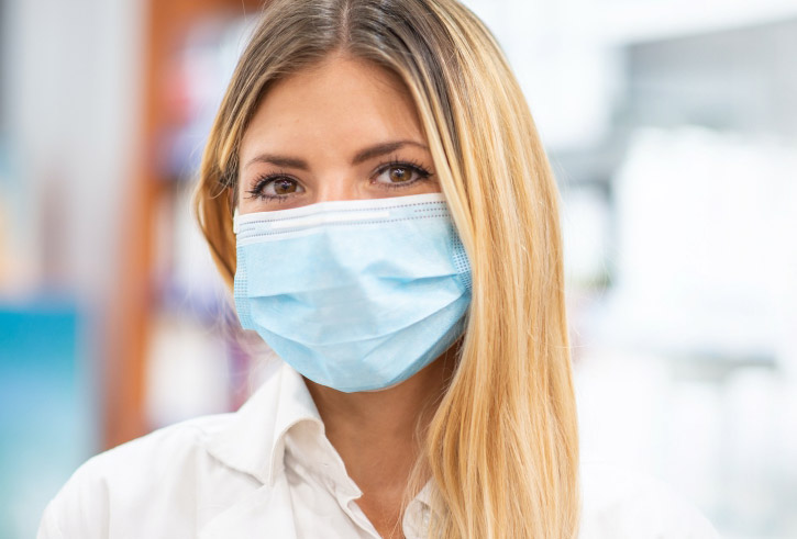 Dental team member wearing protective face mask