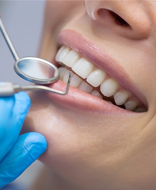 Patient receiving scaling and root planing periodontal therapy