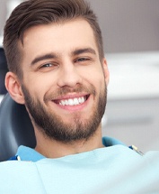 Male dental patient visiting emergency dentist in Newport, RI