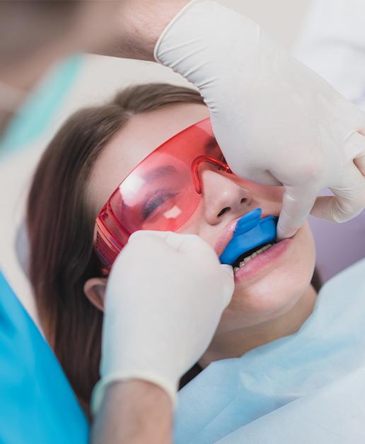 Patient receiving fluoride treatment