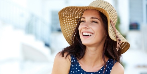 Woman with flawless smile after cosmetic dentistry