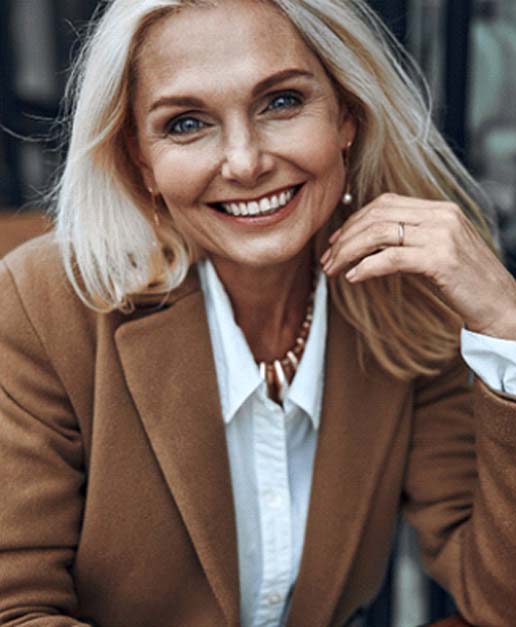 Woman smiling with veneers in Newport