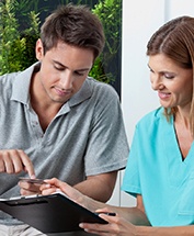 A man paying for dental treatment with dental insurance