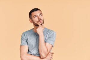 Man wondering if his teeth will be sensitive after getting veneers